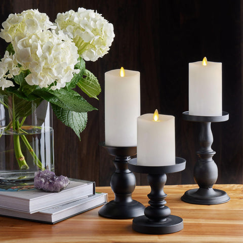 Luminara pillar candles with height variety for layered room lighting.