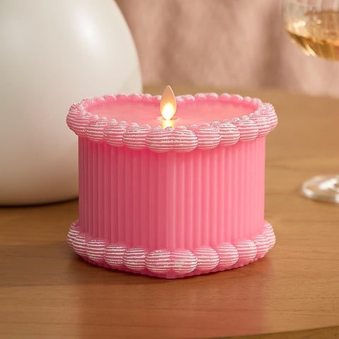 Luminara pink heart cake candle front view offers romantic ambiance with flameless safety.