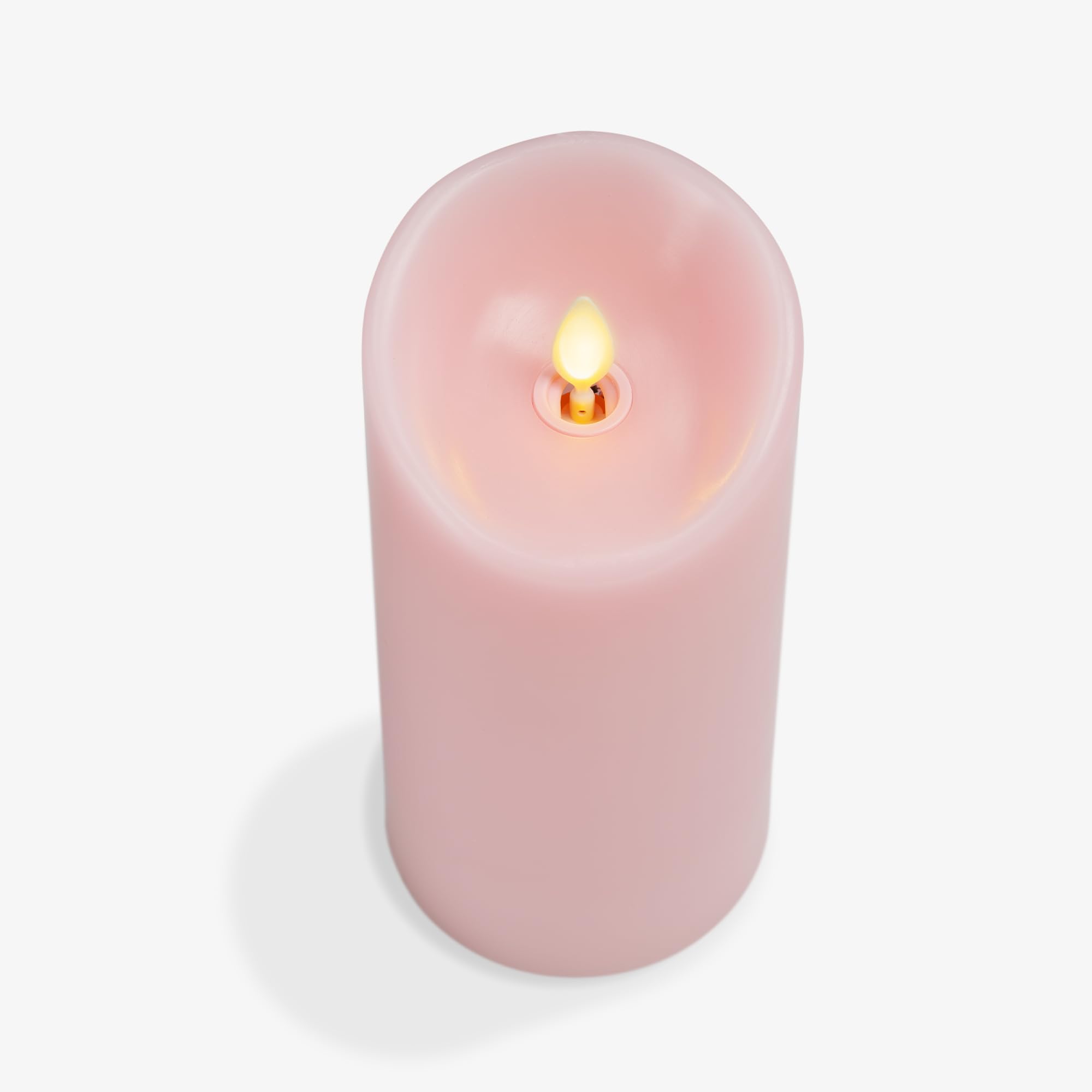 Luminara Saga Rose flameless candle delivering warm mood without smoke.