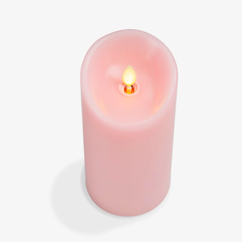 Luminara Saga Rose flameless candle delivering warm mood without smoke.