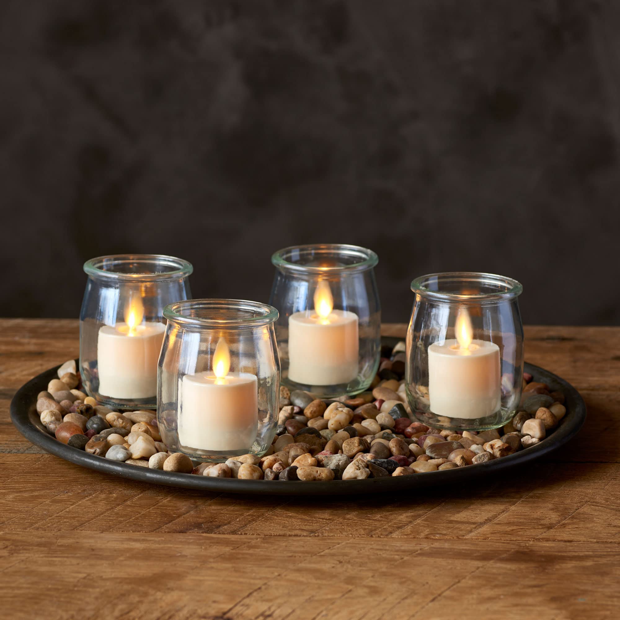 Luminara tealights brighten bedrooms with soft, worry-free illumination.
