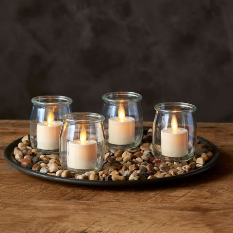 Luminara tealights brighten bedrooms with soft, worry-free illumination.