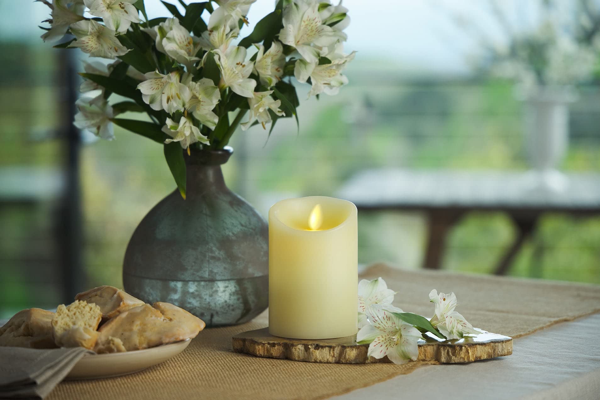Luminara vanilla honey scented pillar candle emits warm fragrance