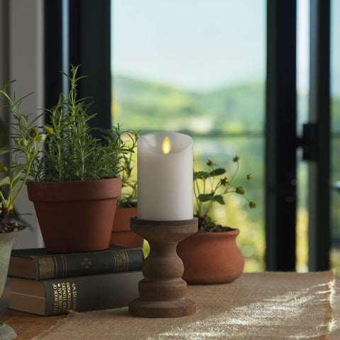 Luminara warm LED flame dances like a real candle for romantic settings.