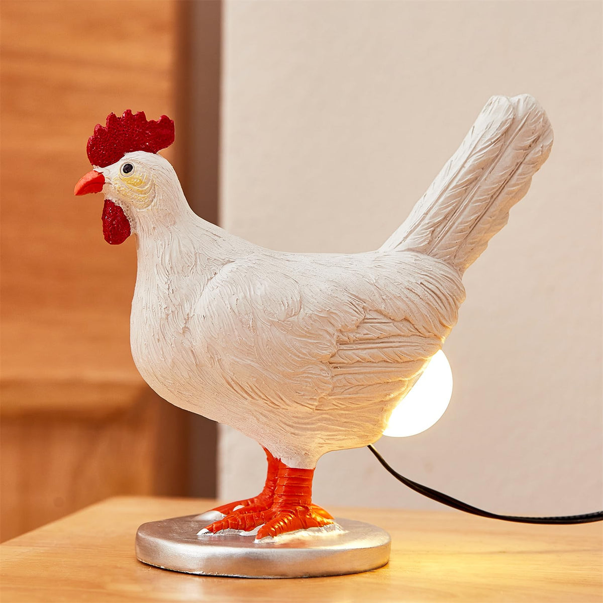 LUOYF Chicken Egg Lamp on a desk with a gentle glow for cozy evenings.