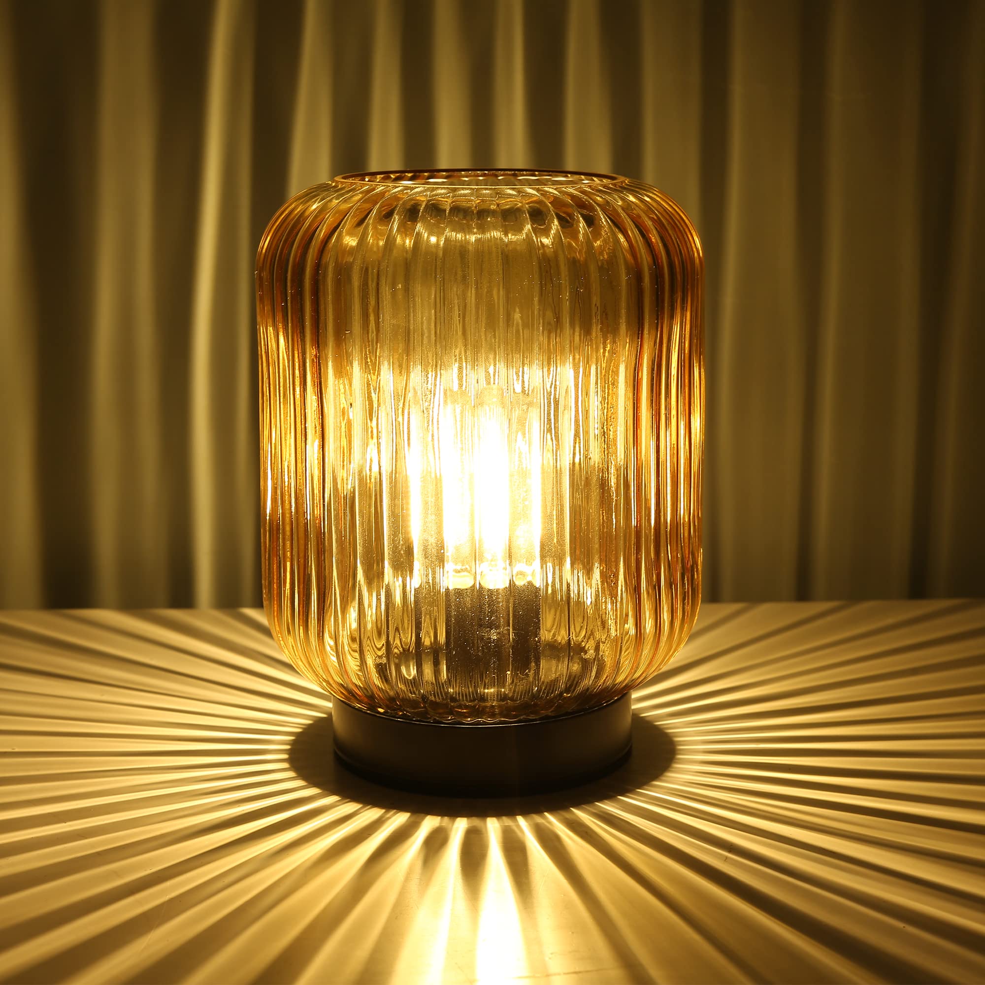 LUSHARBOR battery-operated glass gold lamp adds warm ambience to any room.