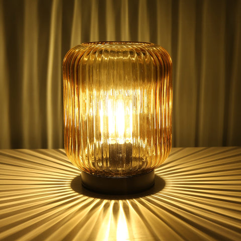 LUSHARBOR battery-operated glass gold lamp adds warm ambience to any room.