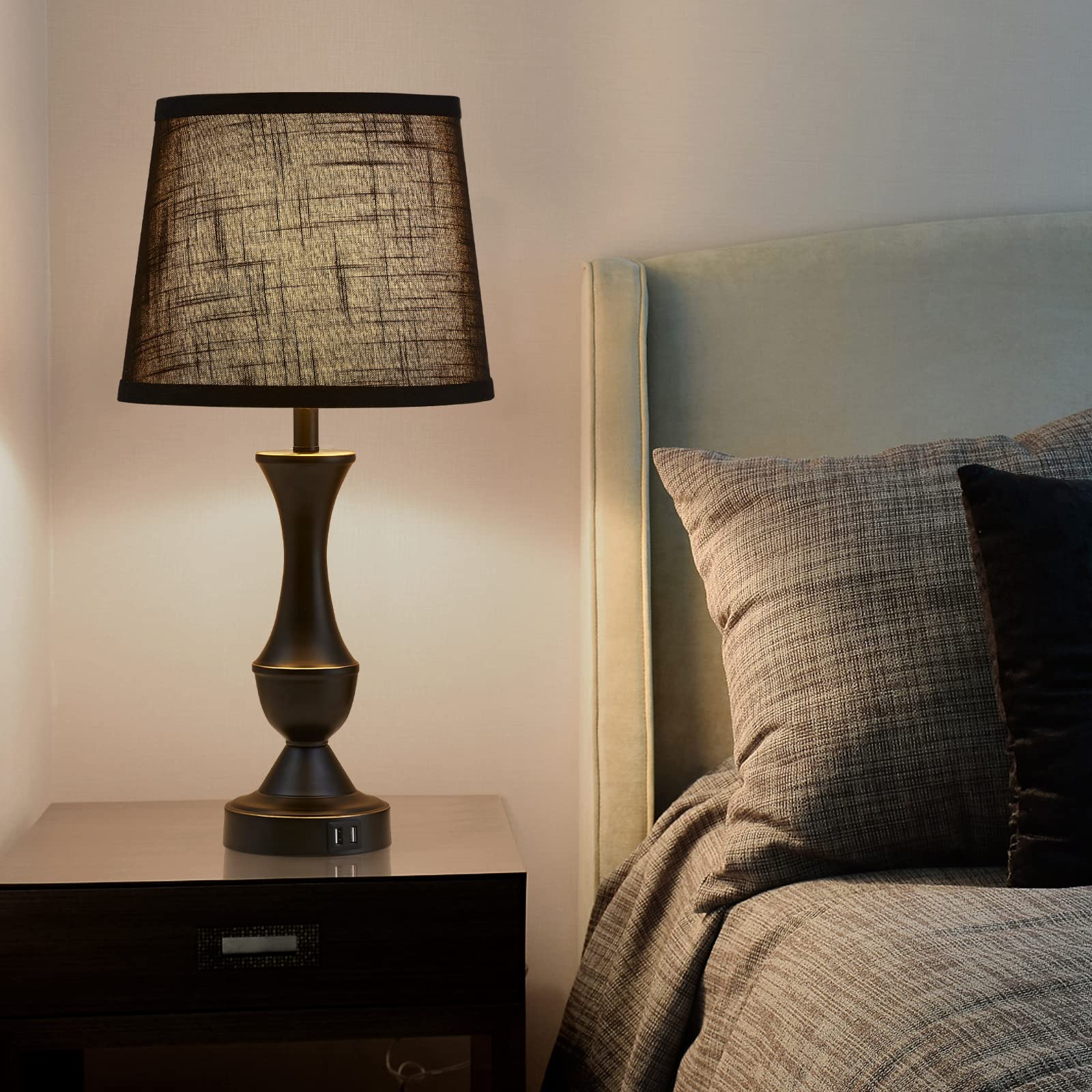 Luvkczc two lamps on a bedside table create balanced symmetry.
