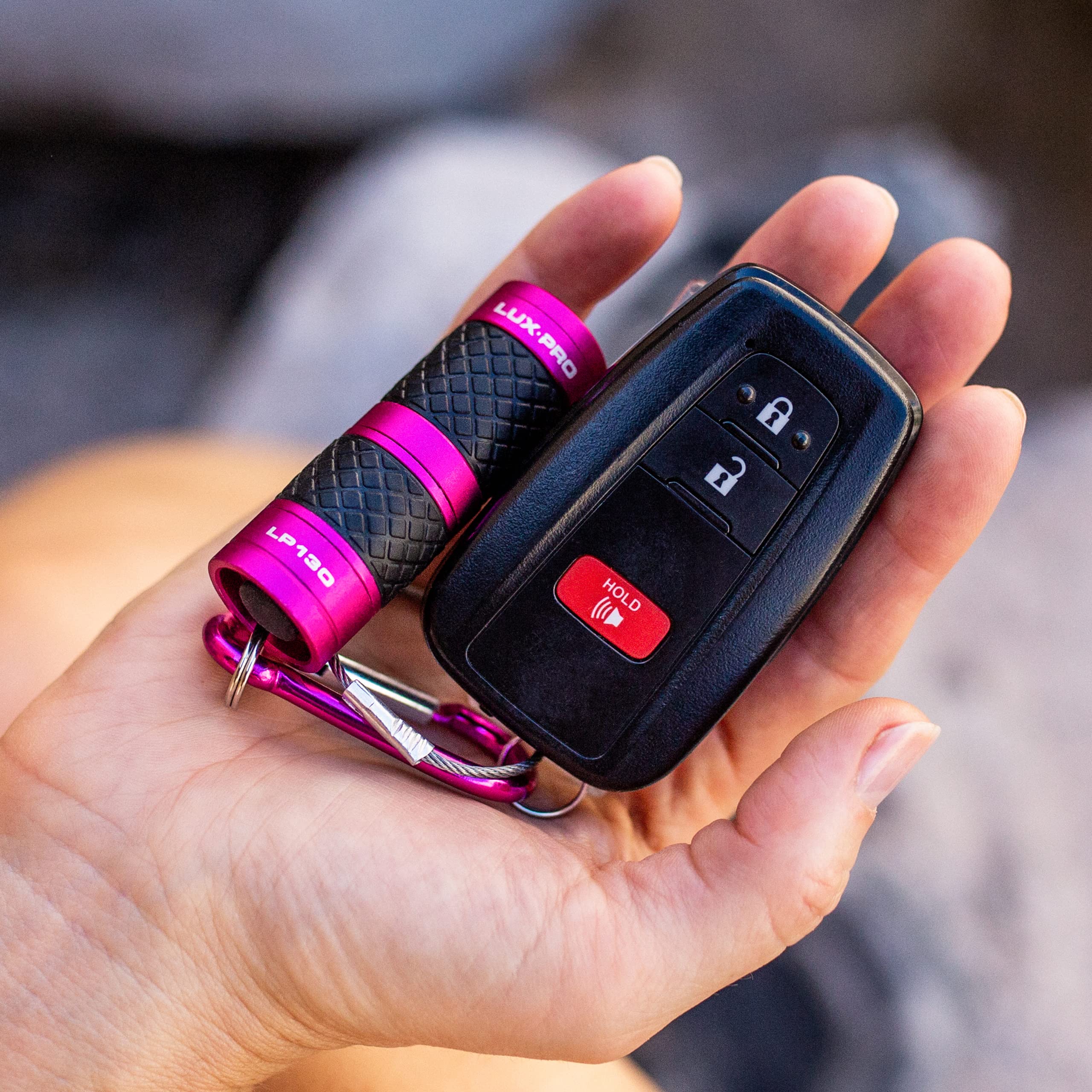 LUXPRO IPX4-rated flashlight resisting splashes outdoors.