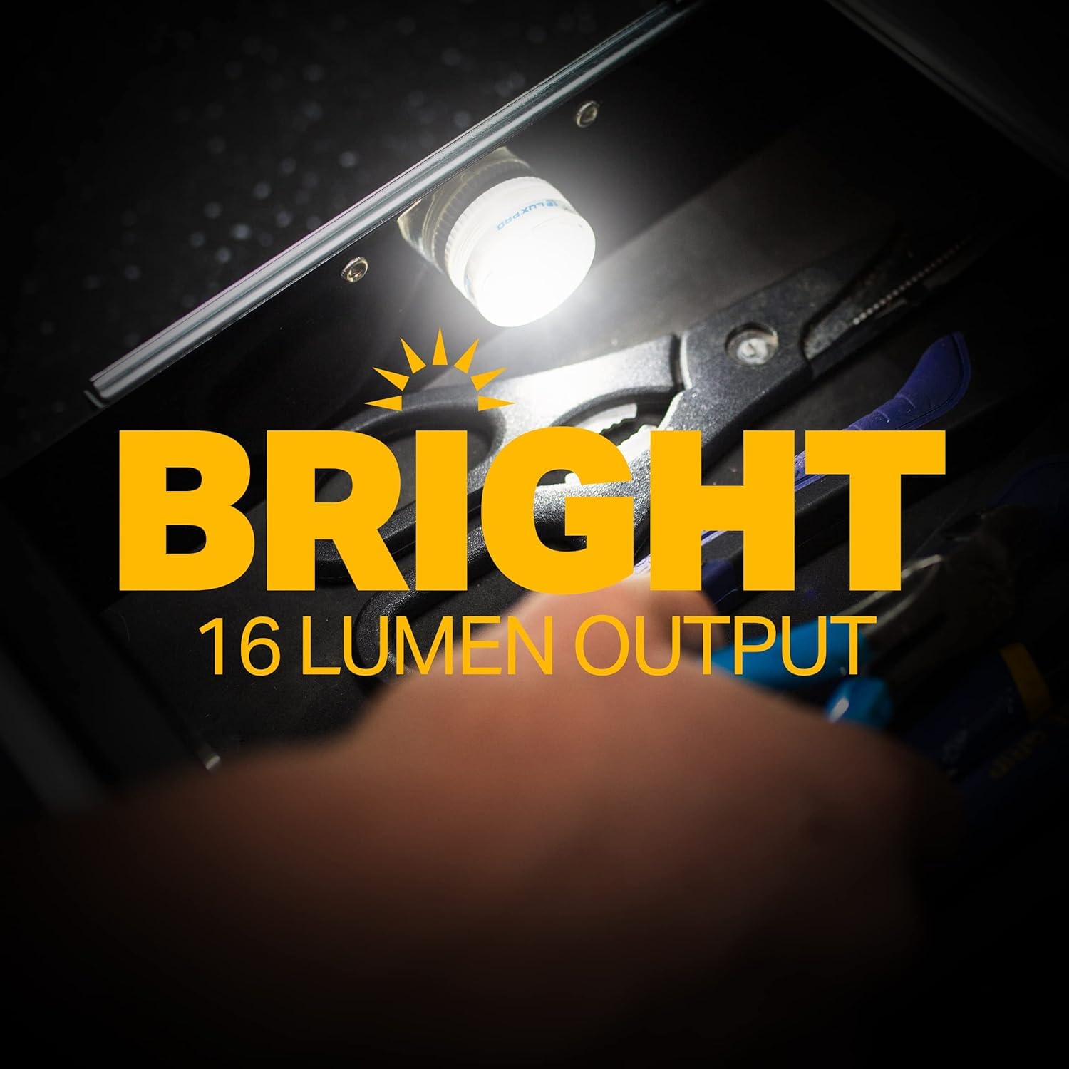 LUXPRO puck light in tackle box improving visibility of tools