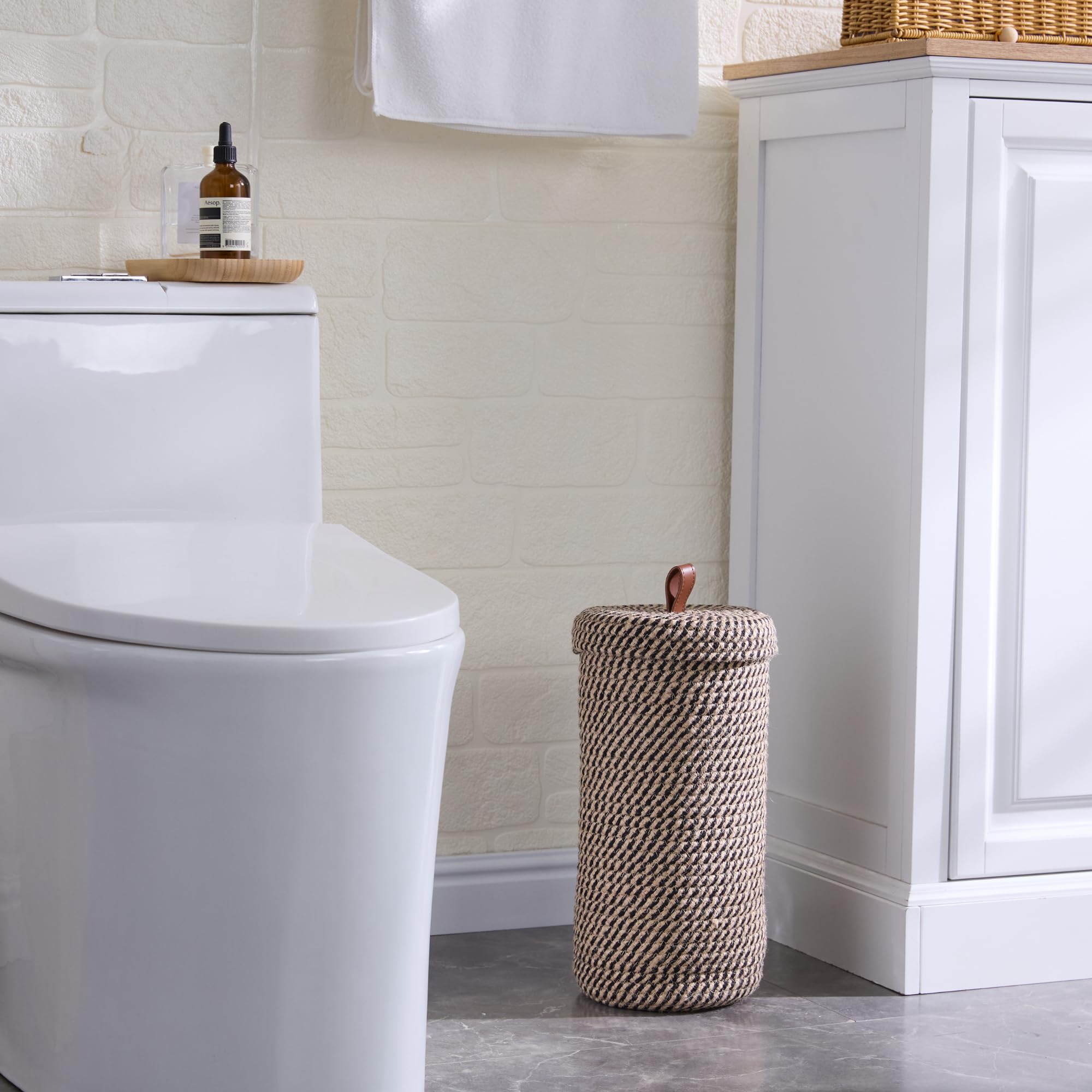 Luxury Little woven cotton three-roll stand ideal for clutter-free bathroom corners.
