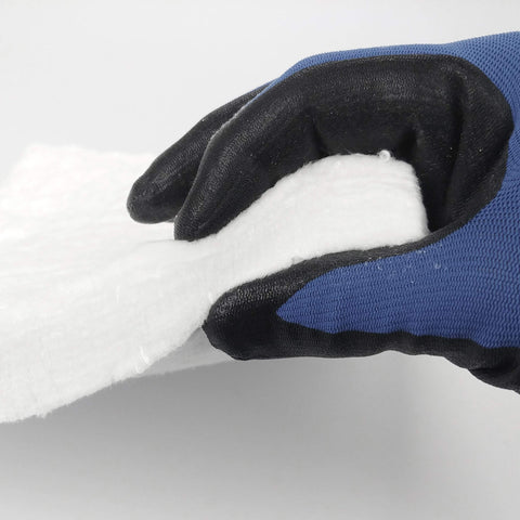 Lynn Manufacturing ceramic fiber blanket in stove setup demonstrates high-temperature containment.