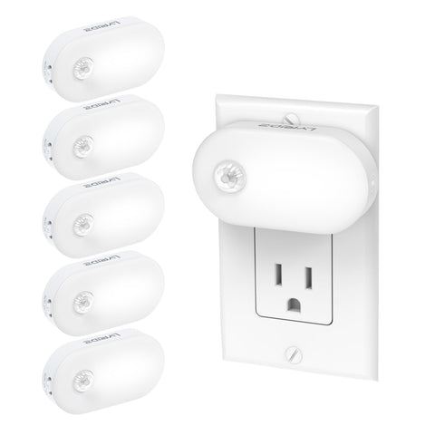Lyridz plug-in night light with motion sensor illuminating a hallway for safe navigation.