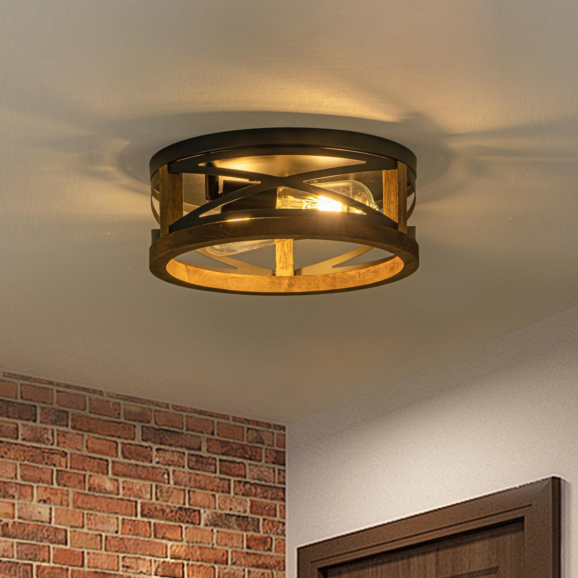 Lzglyptics black metal finish pairs with wood for modern rustic kitchen lighting.