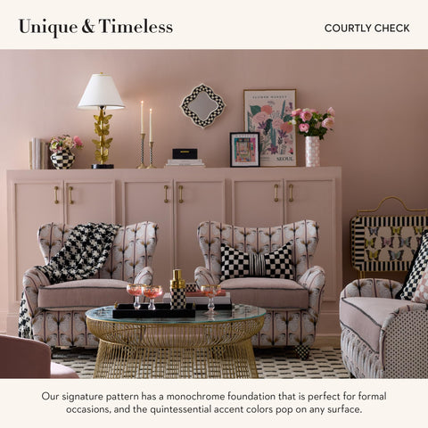 MACKENZIE-CHILDS brass accents and bell shade add refined detail.