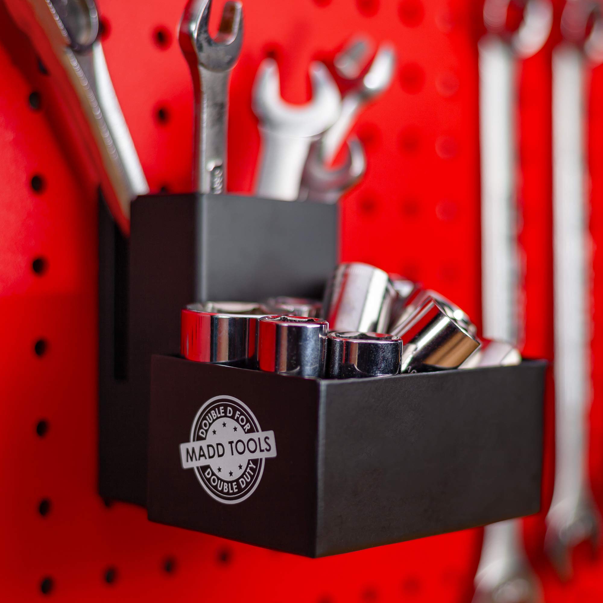 MADD Tools heavy-duty pegboard hooks secure the holder firmly