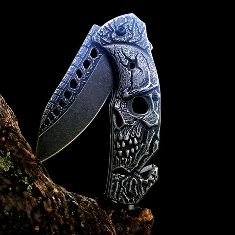 MADSMAUG pocket knife with skull embossed grip for secure daily carry.