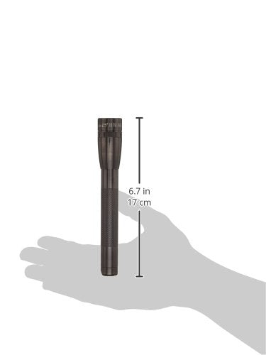 MagLite Mini LED flashlight tucked in pocket for everyday carry