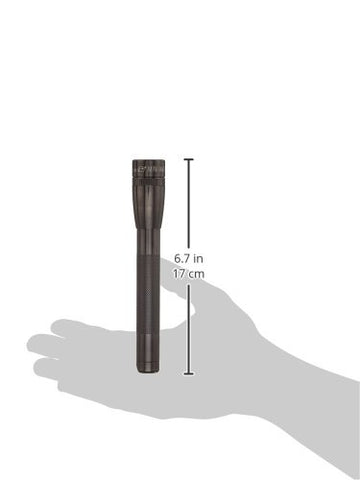 MagLite Mini LED flashlight tucked in pocket for everyday carry
