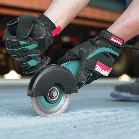 Makita 9557NB angle grinder top with AC/DC switch for power flexibility