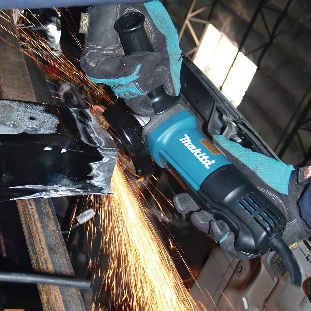 Labyrinth construction seals drive gear from dust on Makita 9557PB.