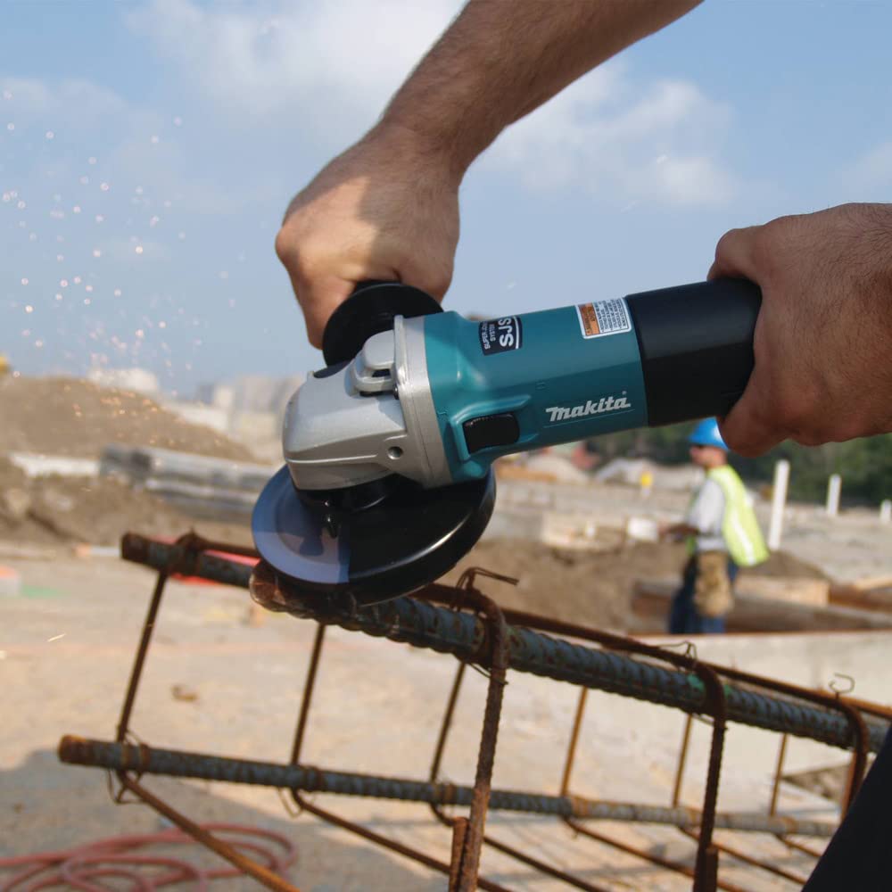 Makita 9564CV in-use demonstrates versatile metal grinding setup.