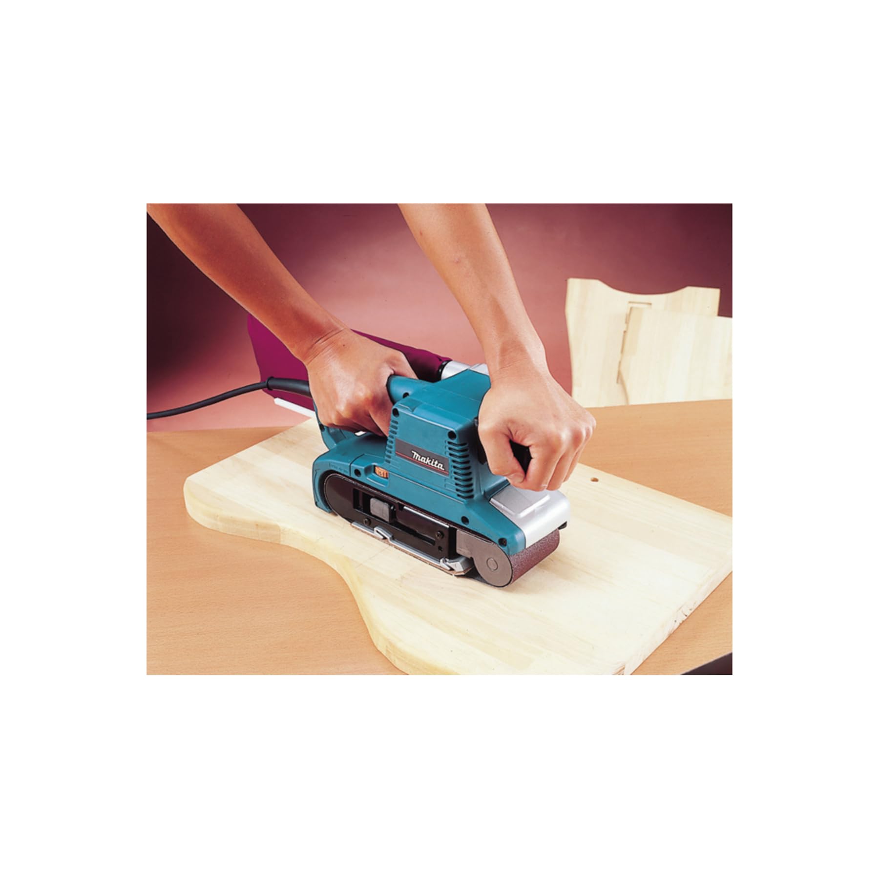 Makita 9903 in use showing control and reach for woodworking tasks
