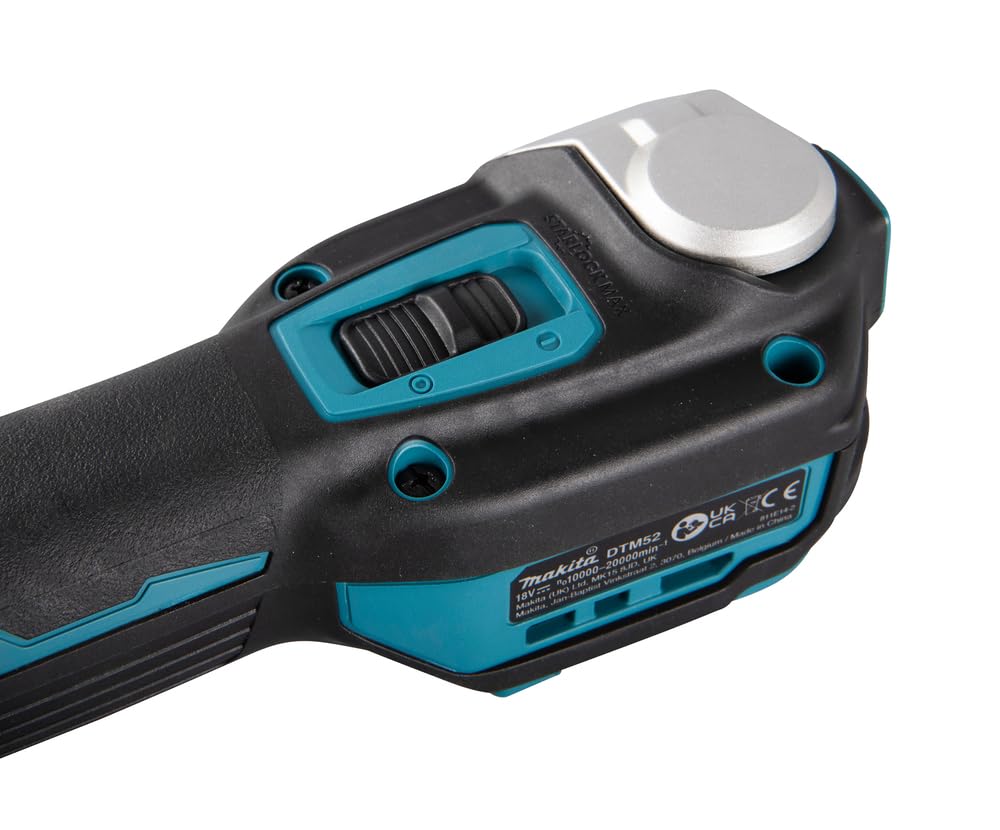 Makita DTM52Z slide switch enables continuous operation.