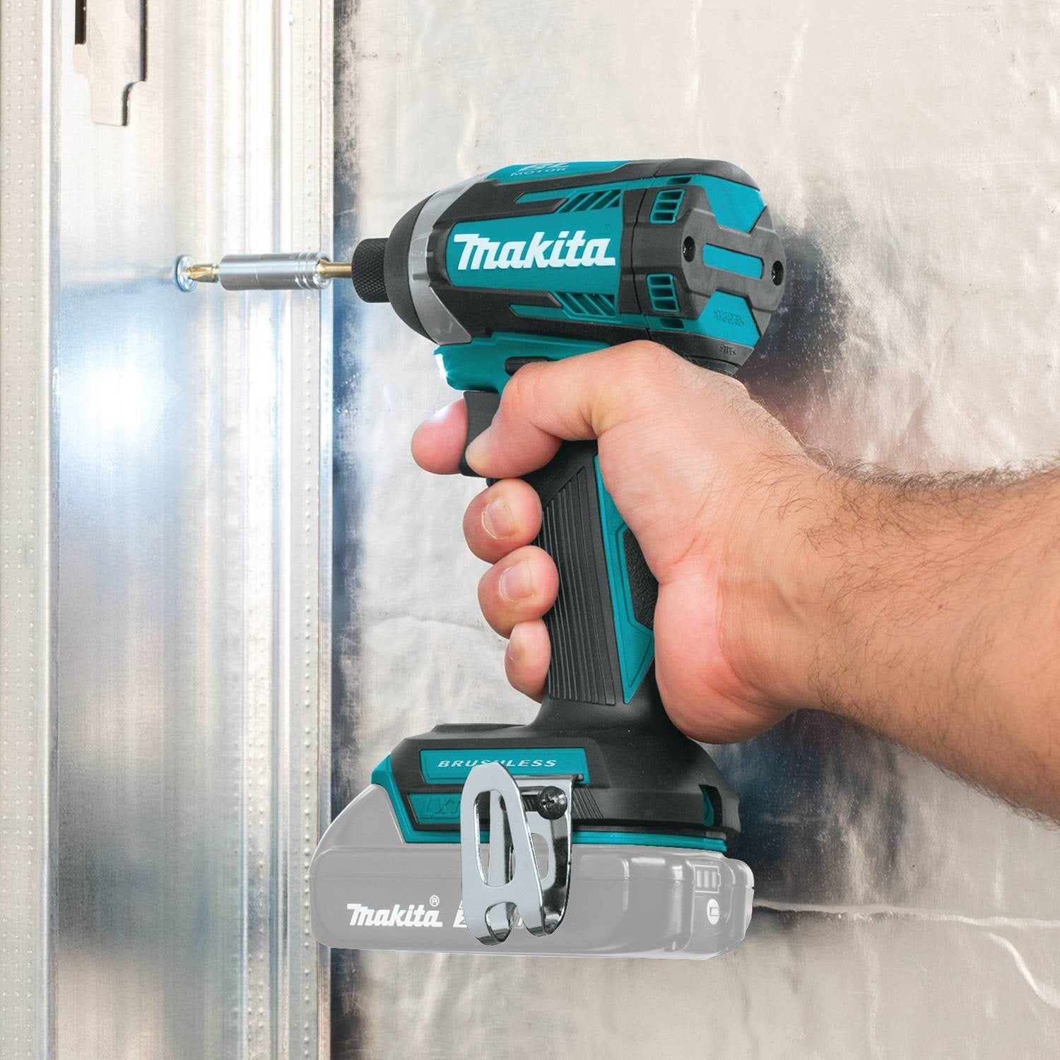 Makita XDT14Z compact length fits into tight spaces between components.