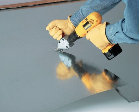 Malco TS1 Turbo Shear cutting 20-gauge galvanized steel with ease