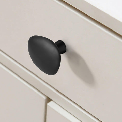Malimali pebble knob matte black closeup shows textured surface and ergonomic grip