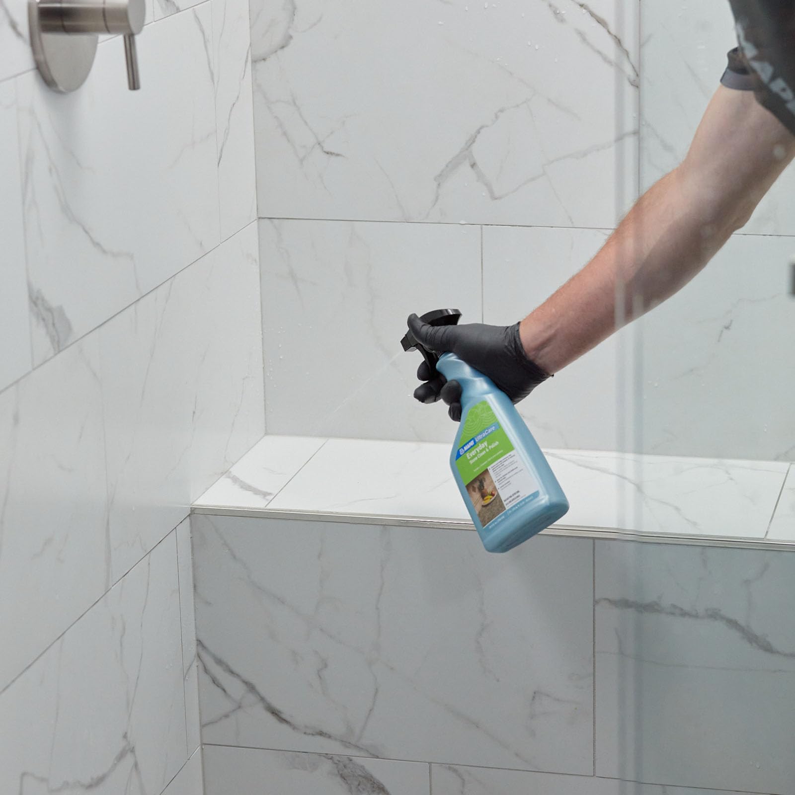 Mapei Ultracare grout cleaning action on tiled grout lines.
