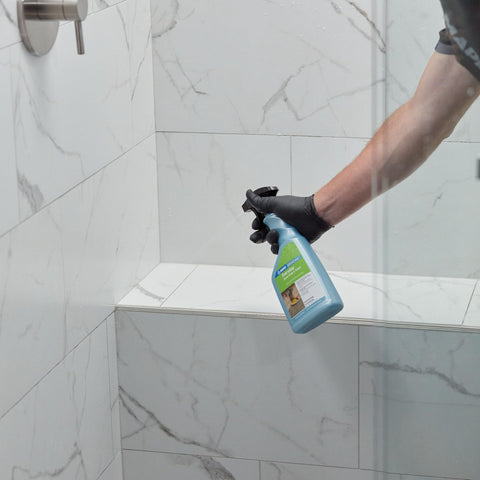 Mapei Ultracare grout cleaning action on tiled grout lines.
