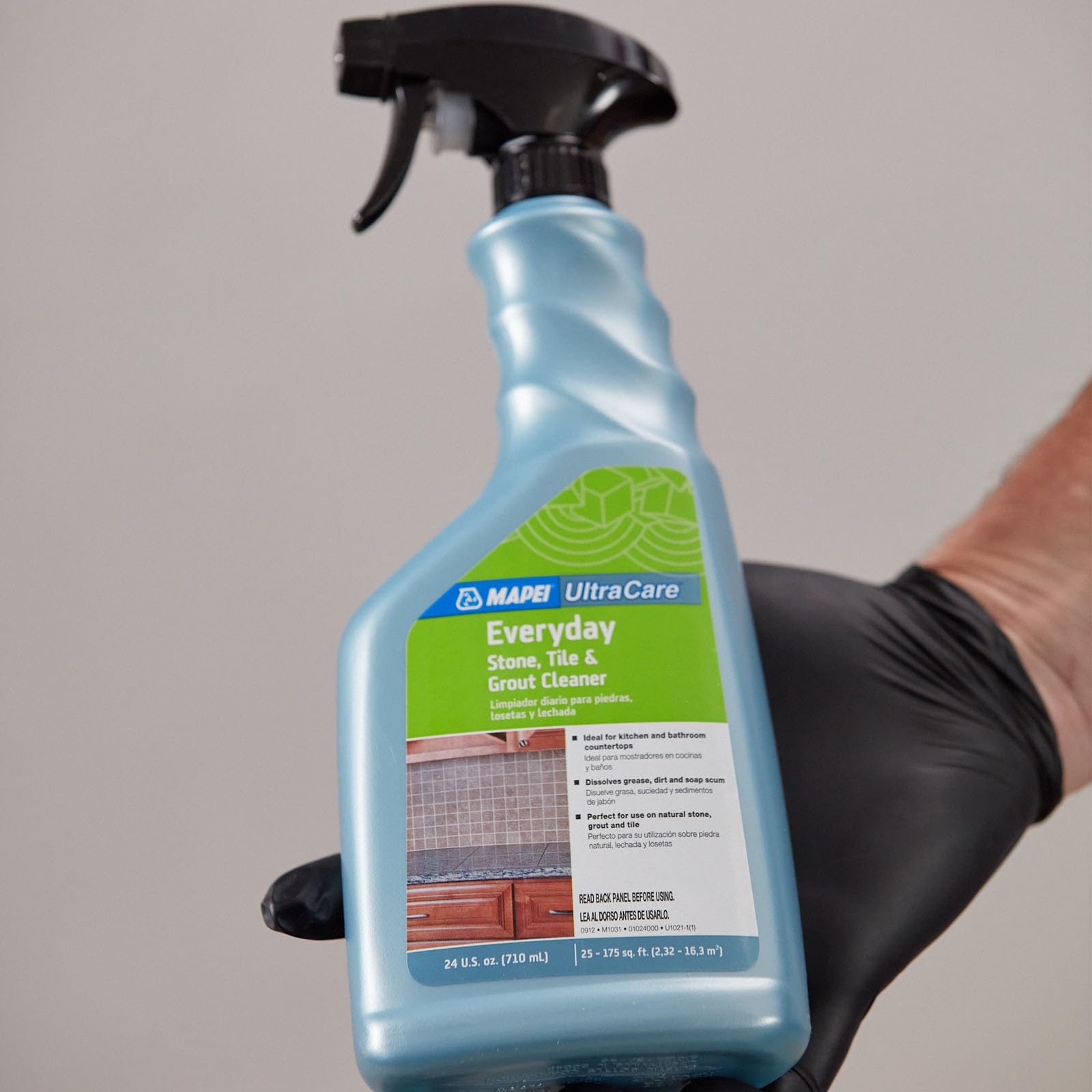 Mapei Ultracare spray action showing easy, ready-to-use cleaning on surfaces.