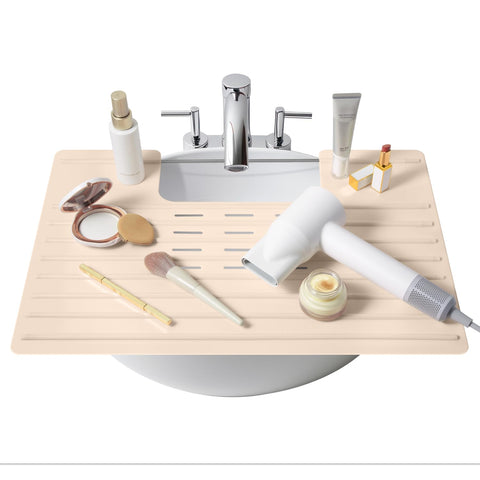 Maplefield beige silicone sink mat with raised ridges keeps makeup from rolling away.