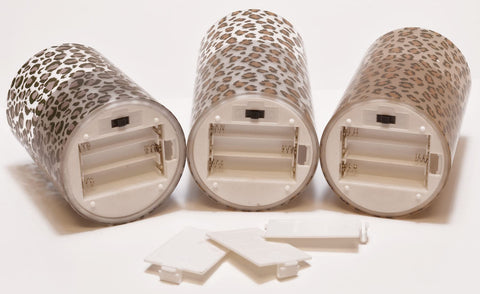 Mark Feldstein & Associates leopard pillar trio with 6-hour timers for daily routines.