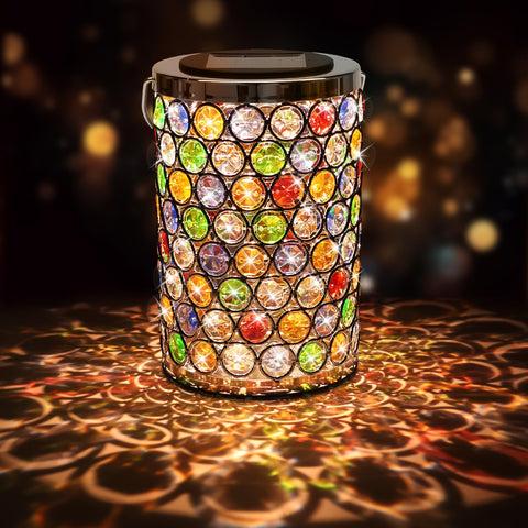 Maromamix mosaic crystal hummingbird lantern casts color on patios.