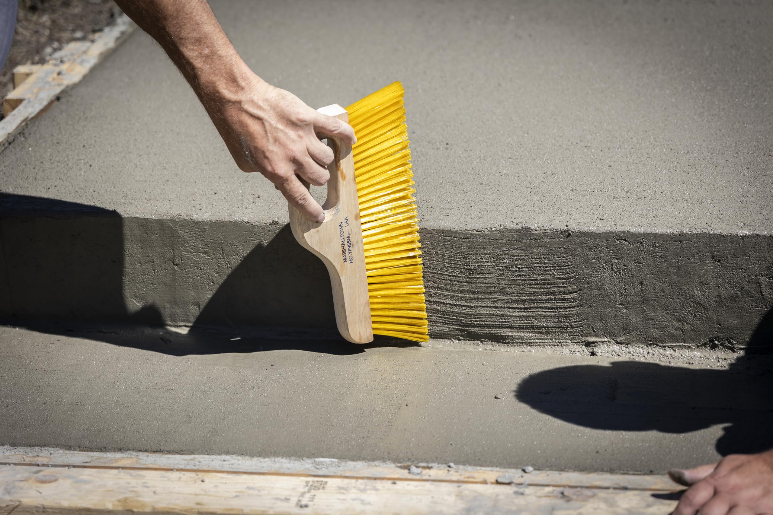 Marshalltown yellow bristles distribute even texture across surfaces