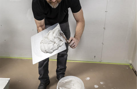Marshalltown aluminum hawk versatile for masonry and drywall tasks on site