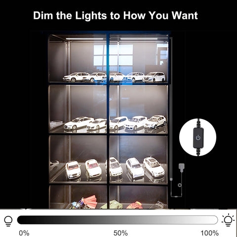 Martronic slim black light bar blends into dark shelves for discreet lighting.