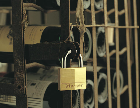 Master Lock 140Q padlock shackle close-up highlights hardened steel resilience.