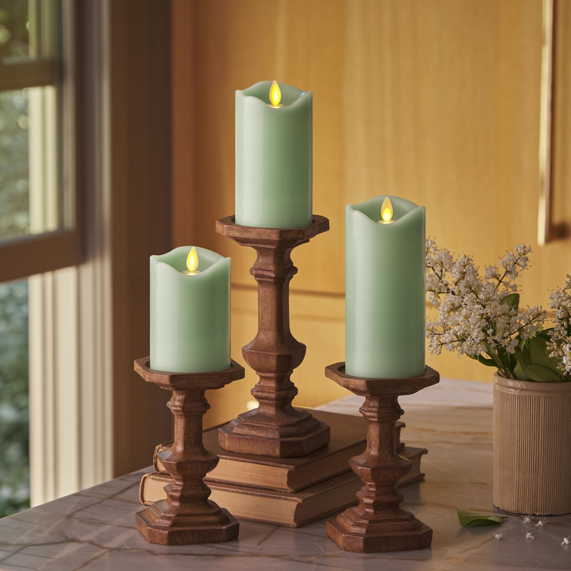 Matchless Candle Co. Luminara pastel-green 4.5-inch pillar candle ambient glow.