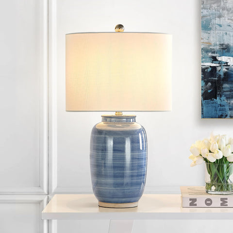 Maxax blue table lamp adds ambient brightness to any space