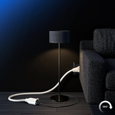 Maximm extension cord in a living room powering multiple devices safely.