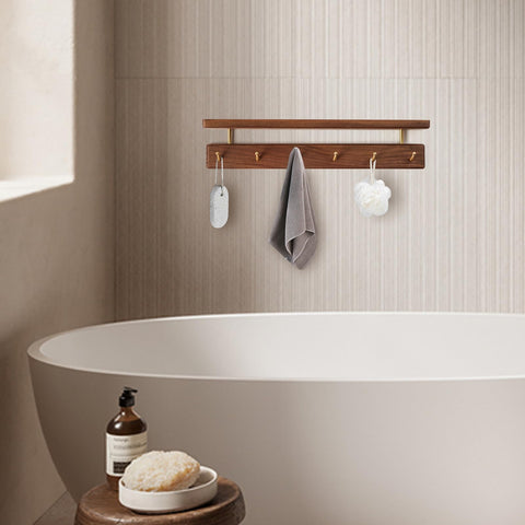Mayhas diagonal brass hooks prevent slipping and snagging items.
