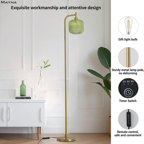 MAYNA green glass shade diffuses soft warm light across study.