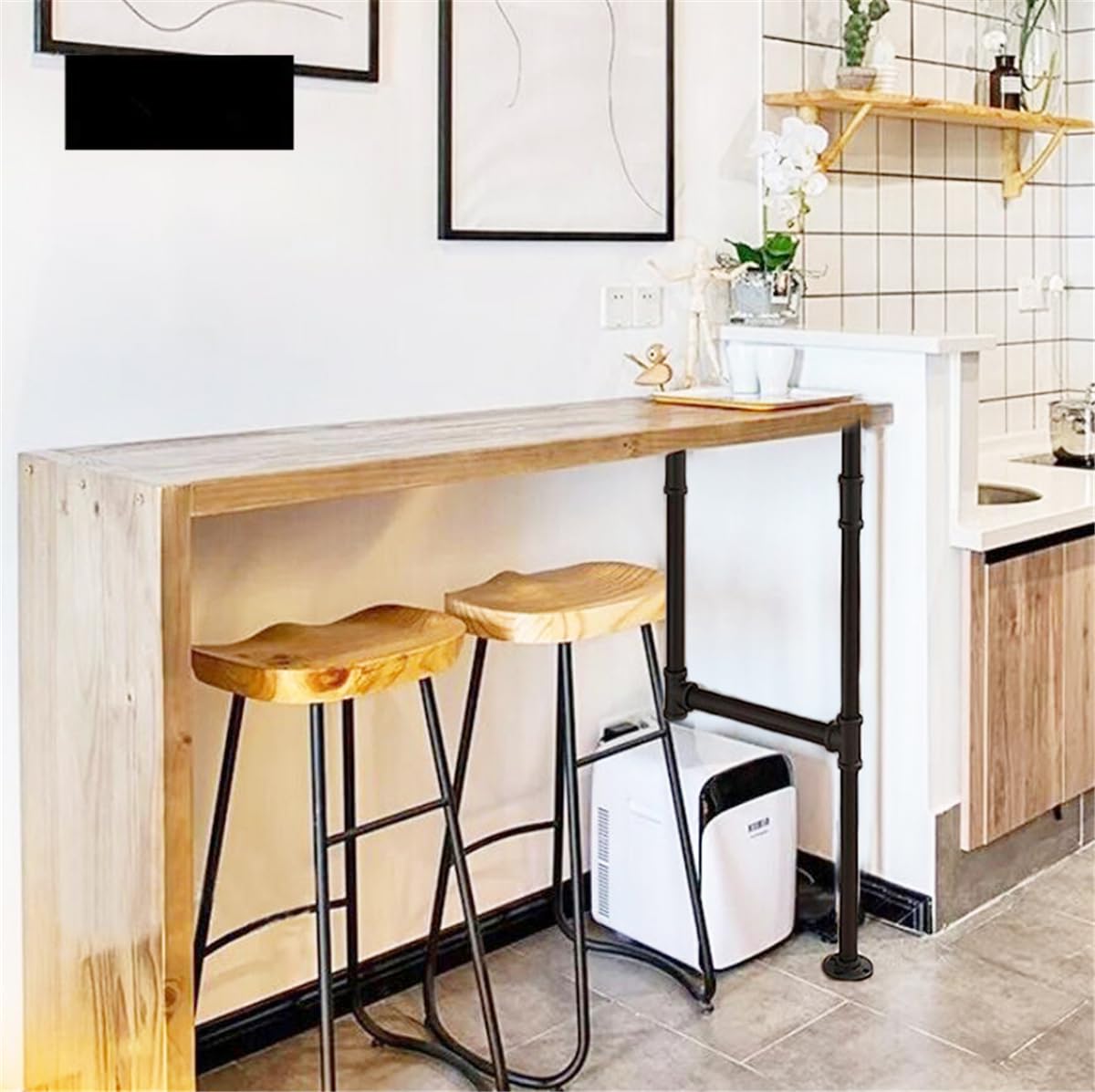 Mdjwjj wood-top pairing with pipe legs creates bold, practical furniture.