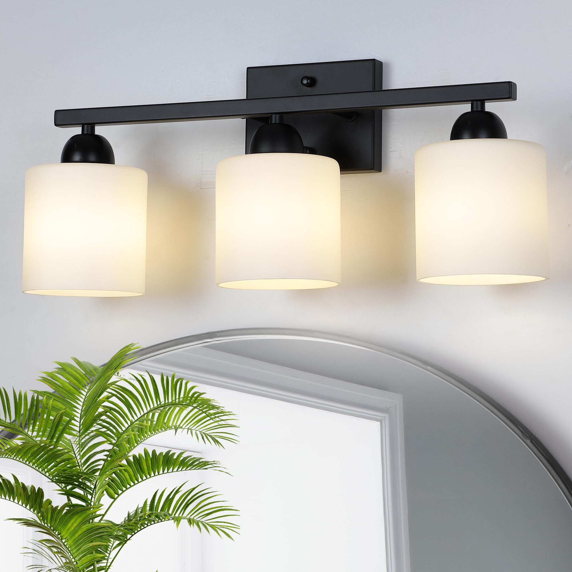 Mecgirn milk glass vanity light with three-shade design for soft, even bathroom illumination.