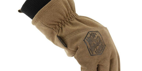 Mechanix Wear water-repellent surface protects against snow and rain on site