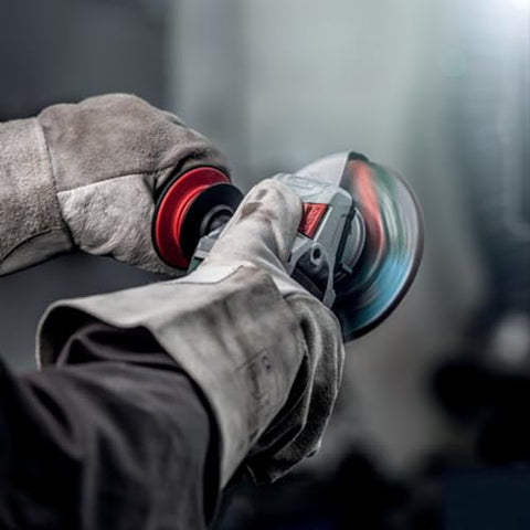 Metabo angle grinder with side handle for reduced fatigue and precise cuts